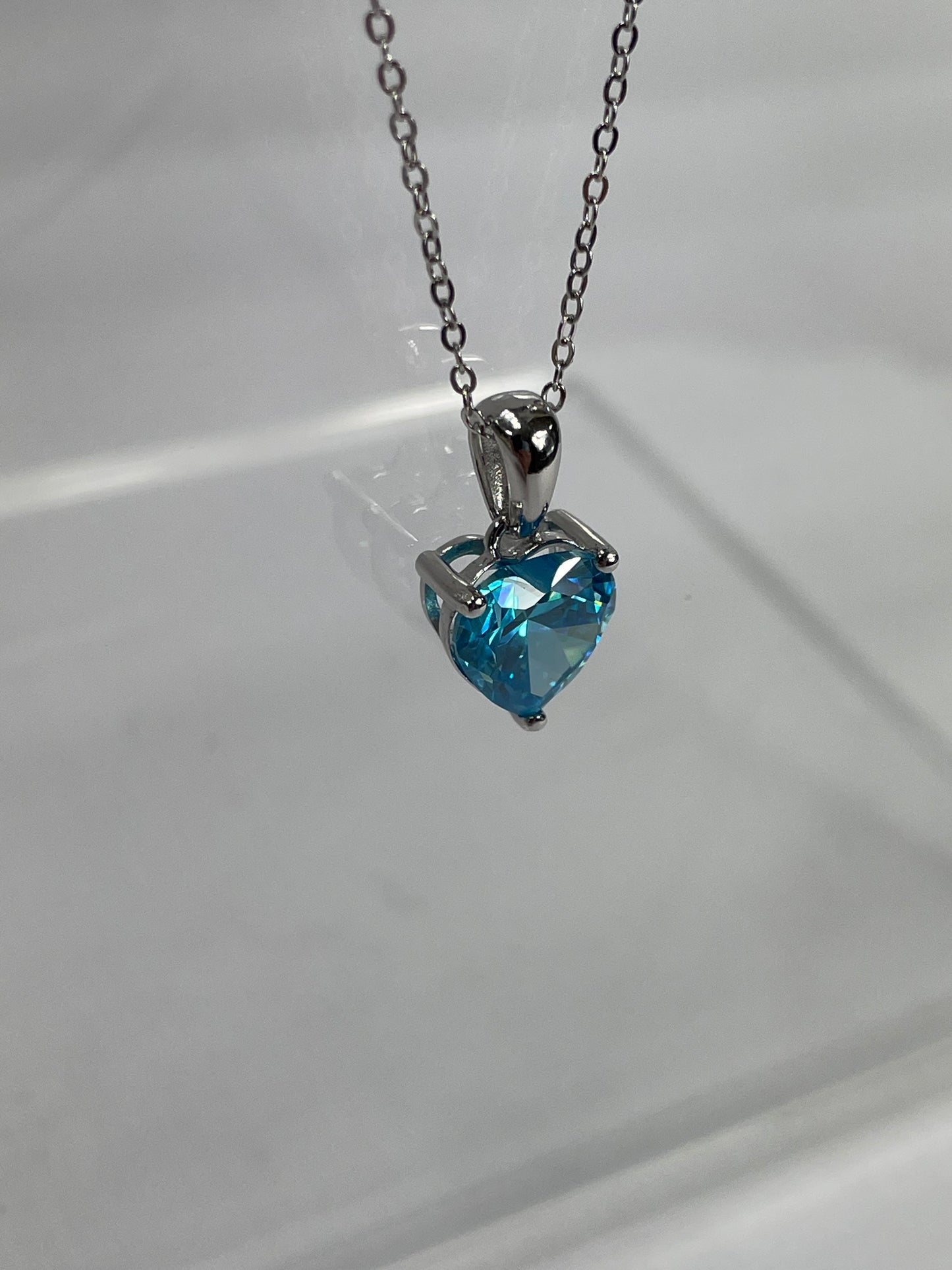 Sterling Silver Necklace with LIGHT BLUE Cubic Zirconia Heart Pendant