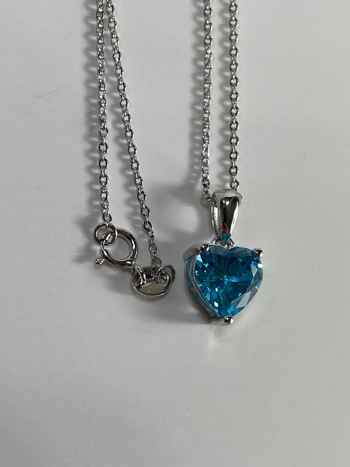 Sterling Silver Necklace with LIGHT BLUE Cubic Zirconia Heart Pendant